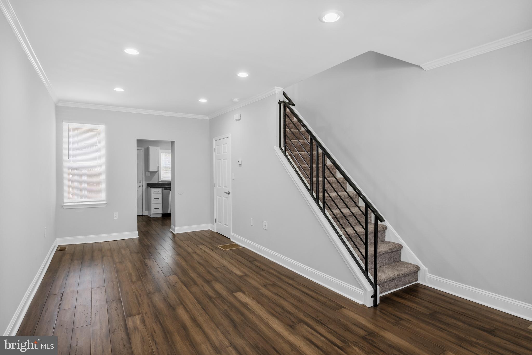 3025 Janney Street Philadelphia, PA 19134 - Photo 7 of 24 a view of a hallway with wooden floor and stairs