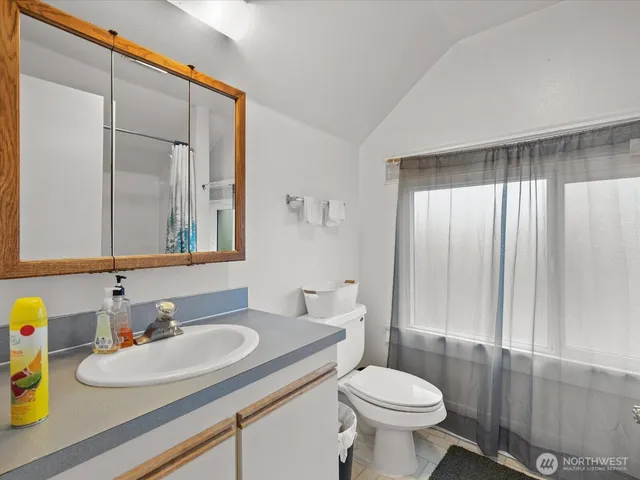 a view of a car parked in front of a building