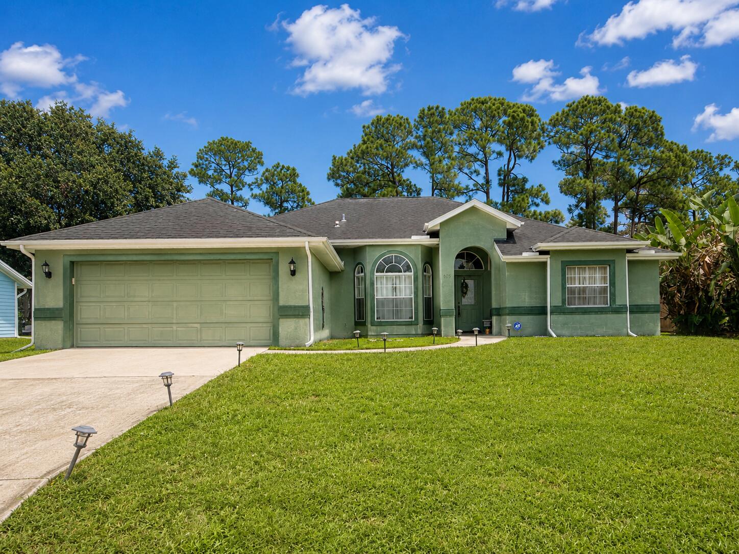 609 Southwest Jada Road Port St. Lucie, FL 34953 - Photo 1 of 29 Front of Structure
