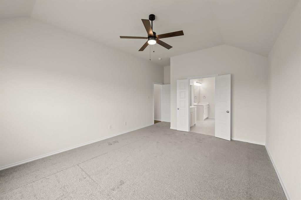 10809 Rothland Street Crowley, TX 76036 - Photo 22 of 30 an empty room with closet and windows