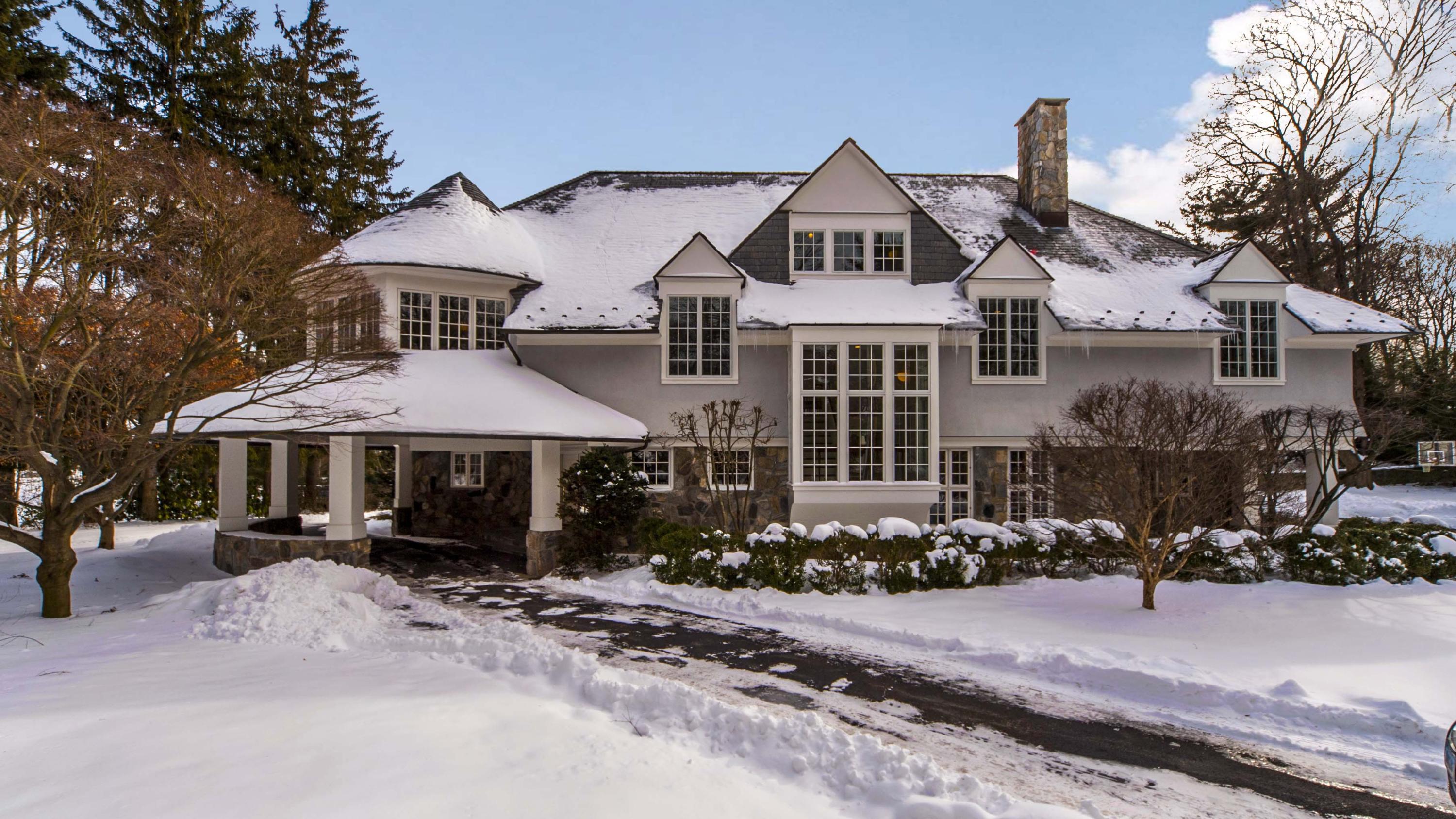 48 Old Farm Road Darien, CT 06820 - Photo 1 of 36 a front view of a house with a yard and trees