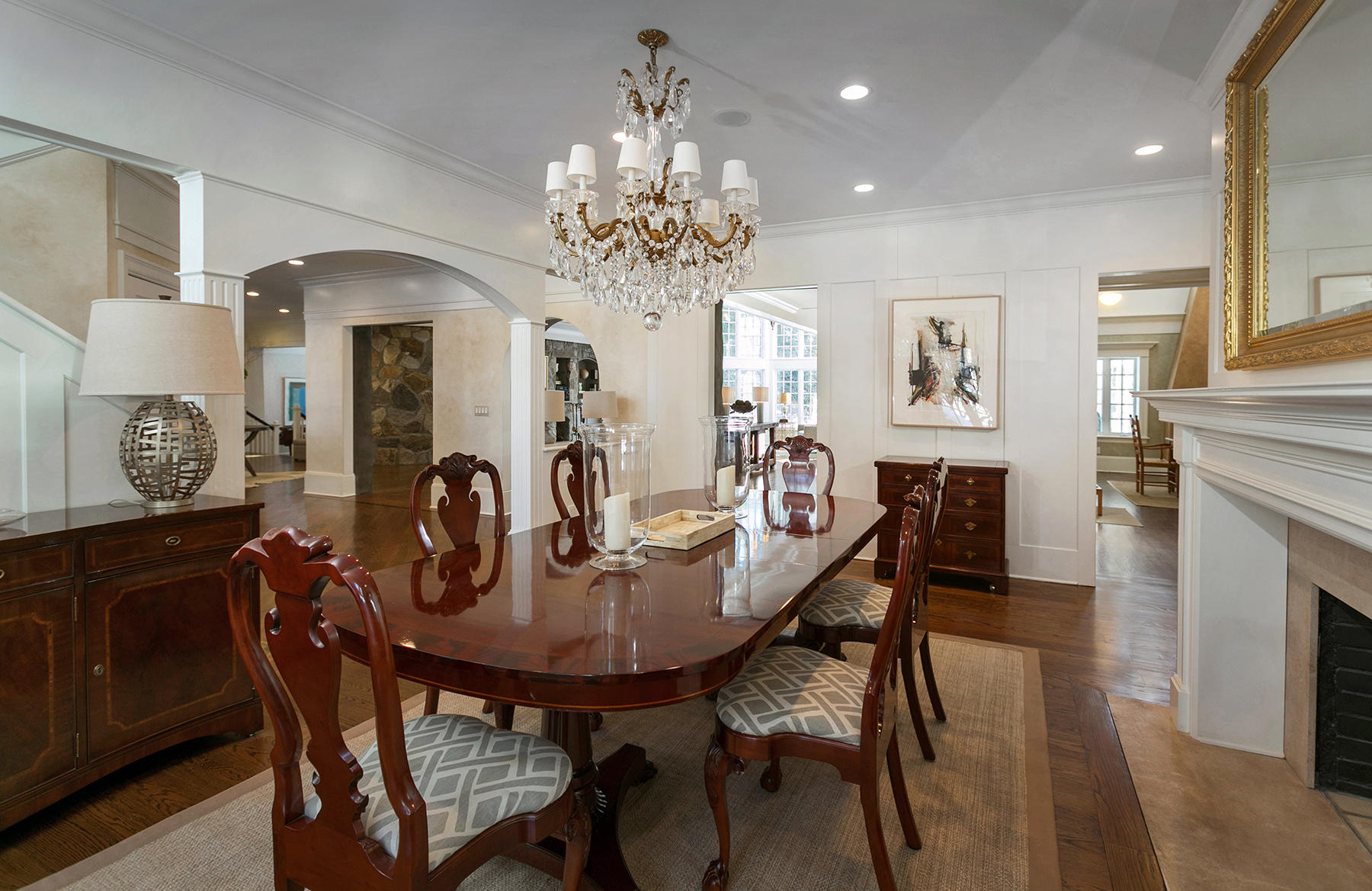 48 Old Farm Road Darien, CT 06820 - Photo 14 of 36 a view of a dining room with furniture a chandelier and wooden floor