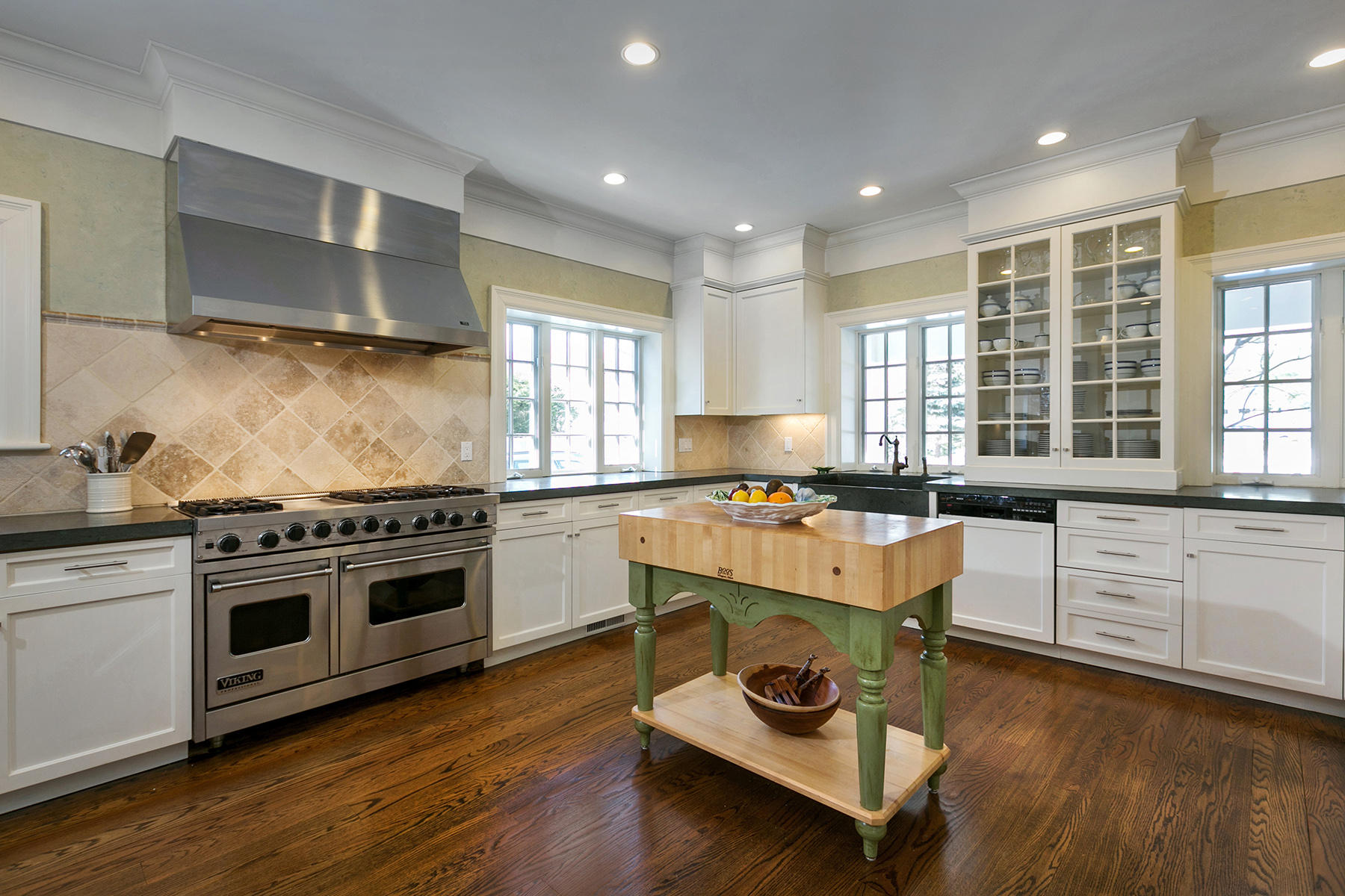 48 Old Farm Road Darien, CT 06820 - Photo 15 of 36 a kitchen with a stove a sink and wooden floor
