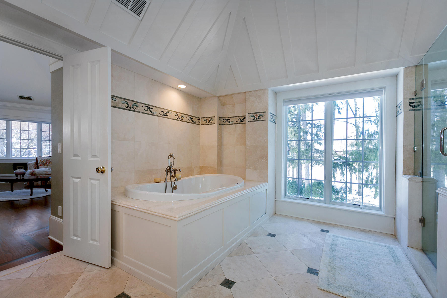 48 Old Farm Road Darien, CT 06820 - Photo 23 of 36 a bathroom with a sink a tub and a mirror