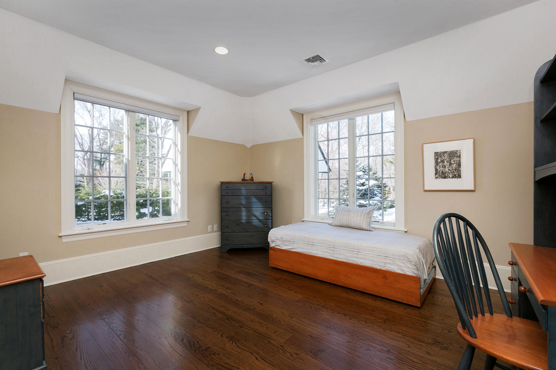 48 Old Farm Road Darien, CT 06820 - Photo 26 of 36 a spacious bedroom with a bed and wooden floor