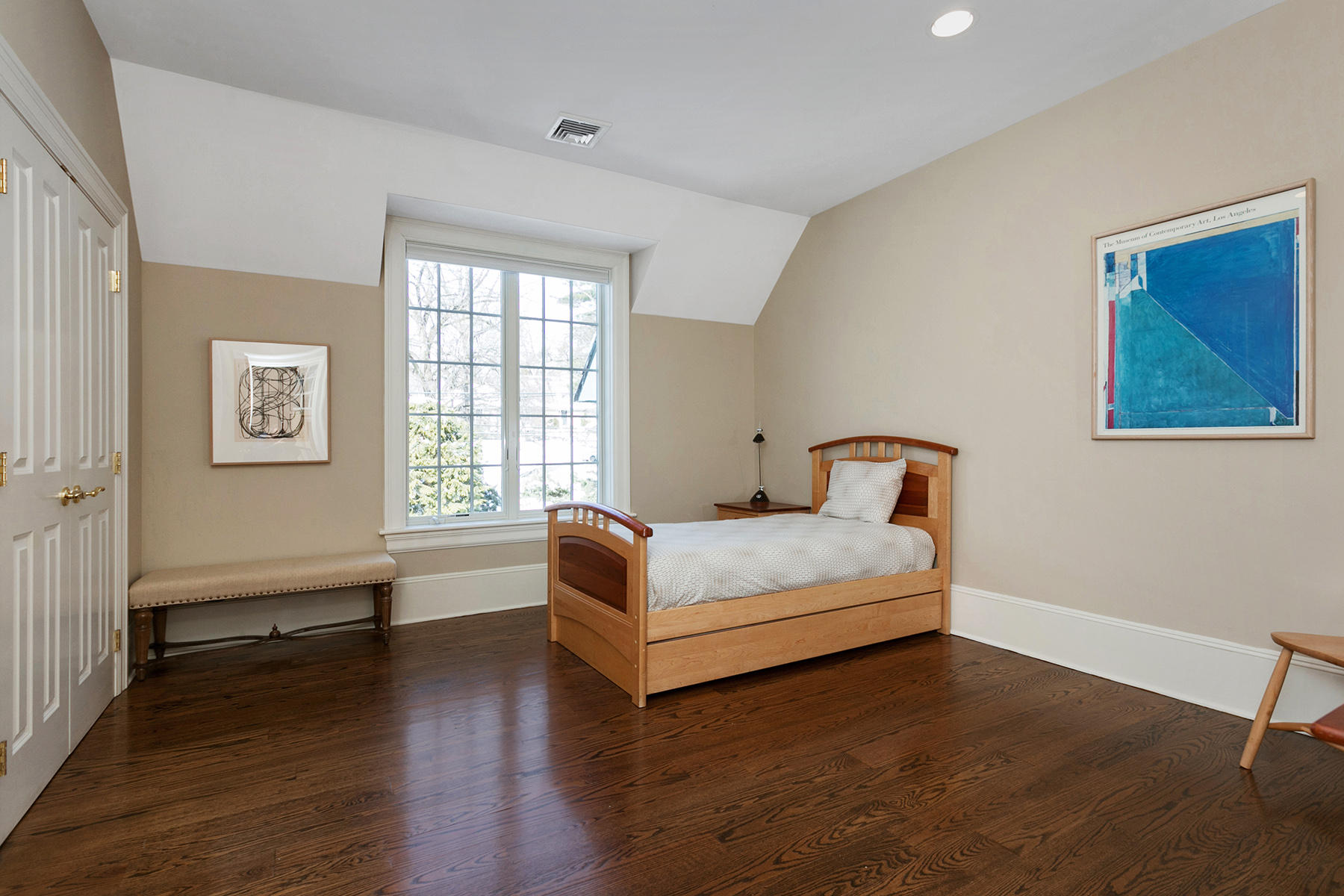 48 Old Farm Road Darien, CT 06820 - Photo 28 of 36 a bedroom with a bed and a window