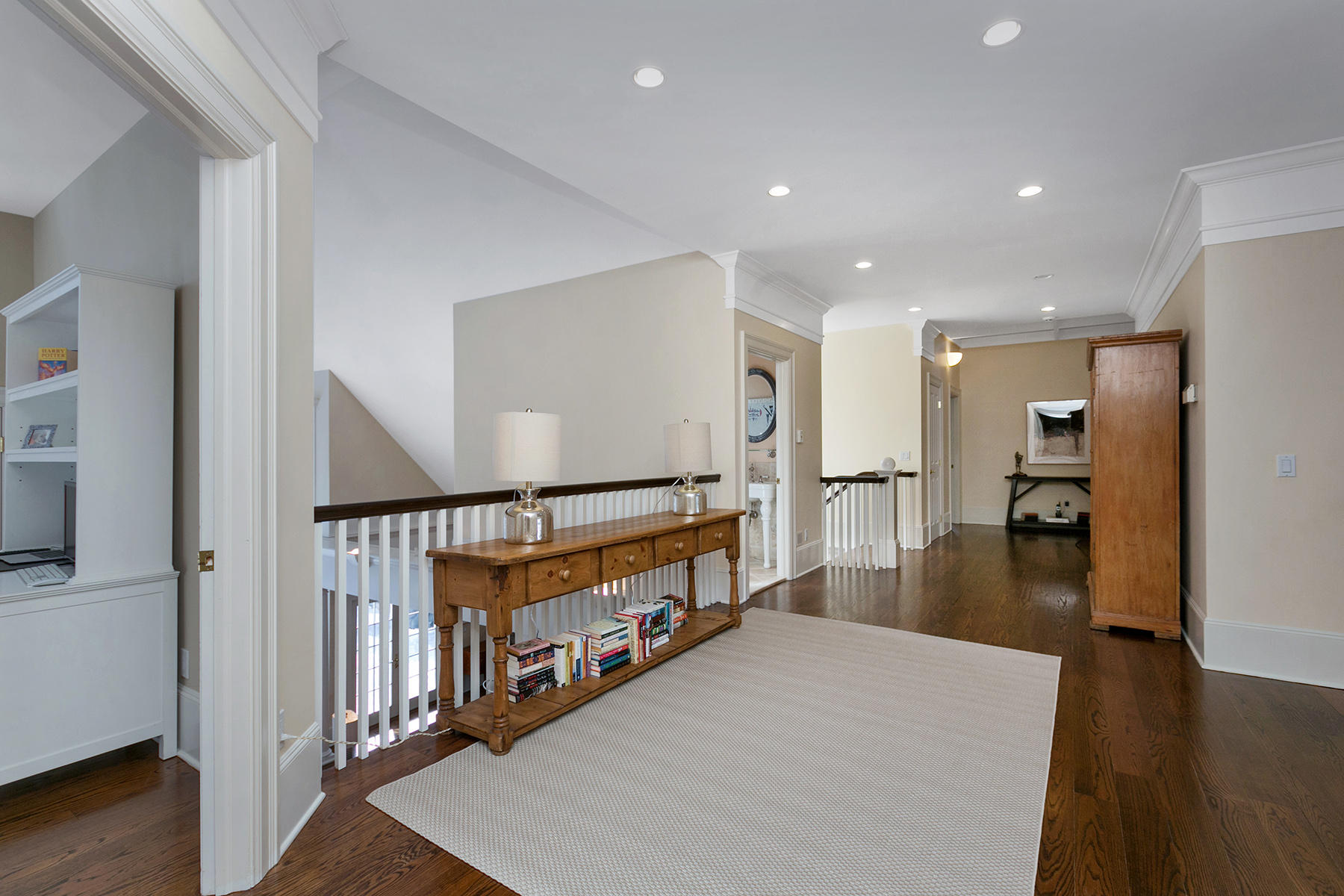 48 Old Farm Road Darien, CT 06820 - Photo 29 of 36 a view of a hallway with wooden floor and stairs