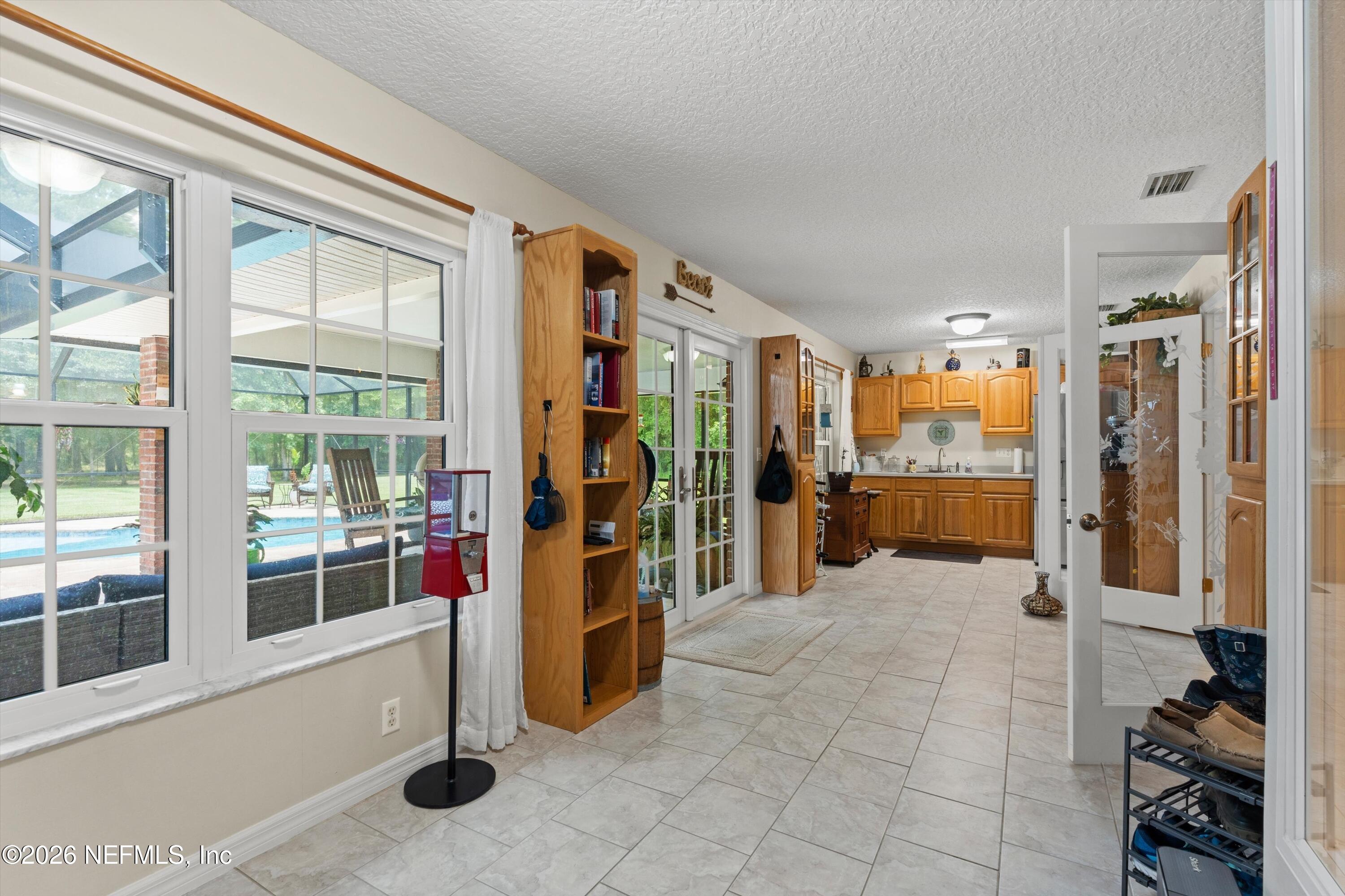 5566 Don Manuel Road Elkton, FL 32033 - Photo 30 of 47 a large white room with windows