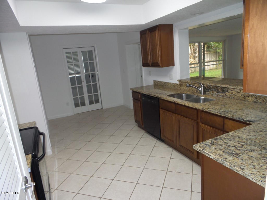 1140 Cromey Road Northeast Palm Bay, FL 32905 - Photo 3 of 14 Great Gourmet Kitchen with Granite!
