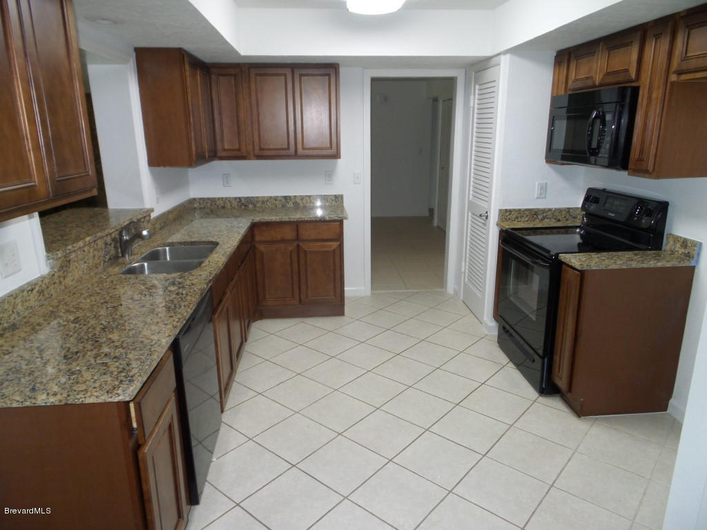 1140 Cromey Road Northeast Palm Bay, FL 32905 - Photo 4 of 14 Great Gourmet Kitchen w. Solid wood Cab