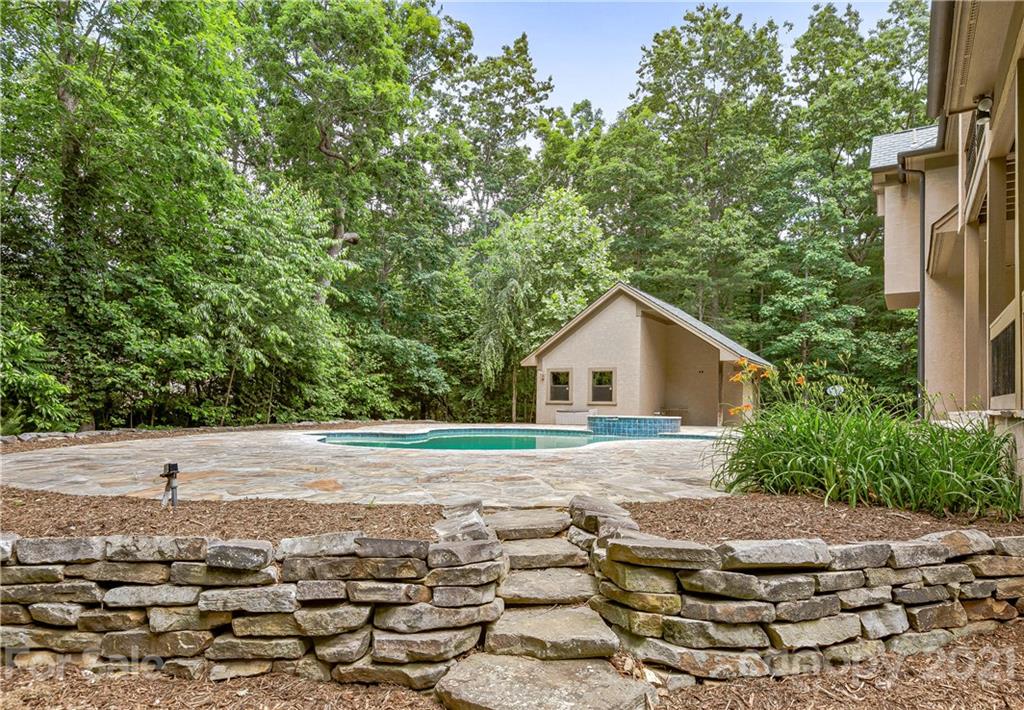 2 Ashbrook Meadows Fletcher, NC 28732 - Photo 2 of 48 a house with trees in the background