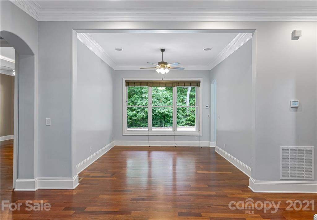 2 Ashbrook Meadows Fletcher, NC 28732 - Photo 12 of 48 a view of empty room with wooden floor and fan