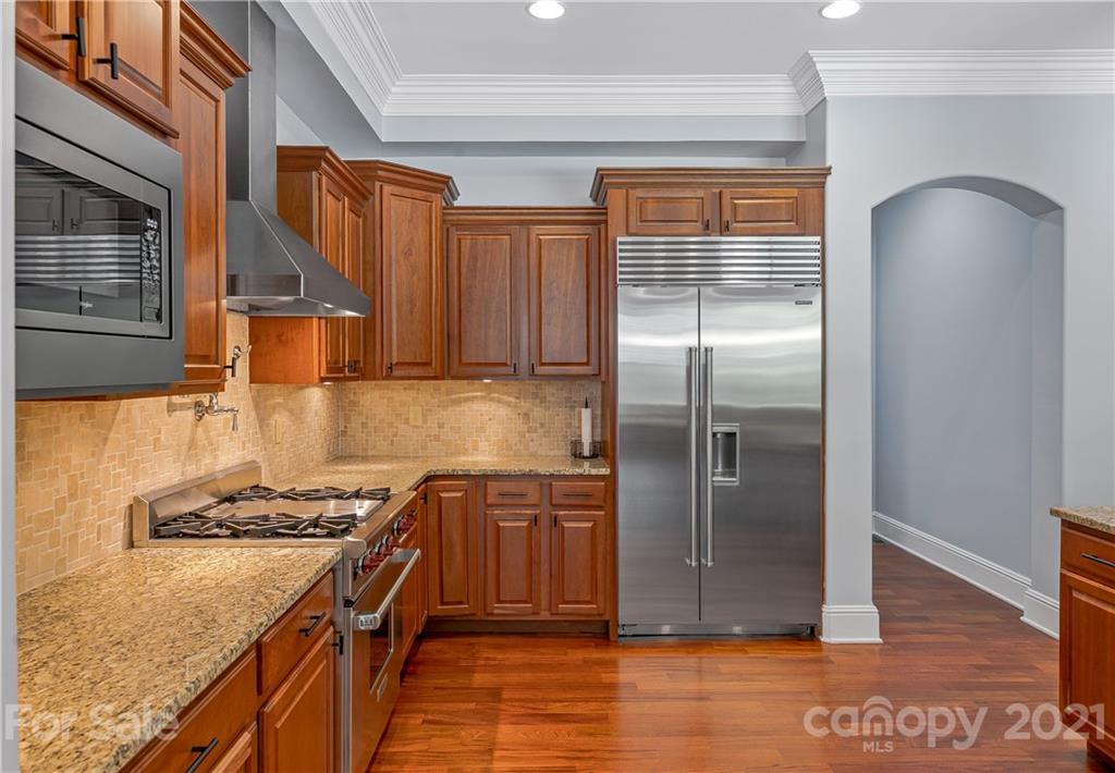 2 Ashbrook Meadows Fletcher, NC 28732 - Photo 14 of 48 a kitchen with stainless steel appliances granite countertop a refrigerator a stove and a sink