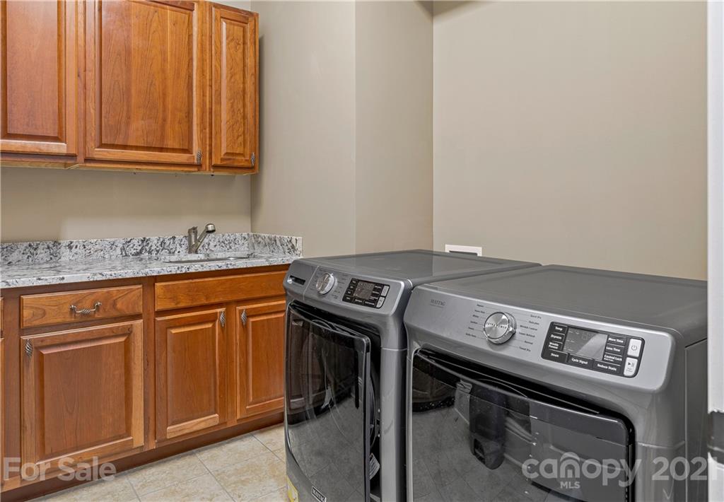 2 Ashbrook Meadows Fletcher, NC 28732 - Photo 22 of 48 a kitchen with a stove and a sink