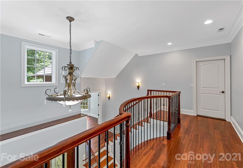 2 Ashbrook Meadows Fletcher, NC 28732 - Photo 23 of 48 a view of an empty room and wooden floor