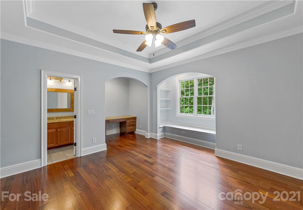 2 Ashbrook Meadows Fletcher, NC 28732 - Photo 28 of 48 a view of an empty room with a window and wooden floor
