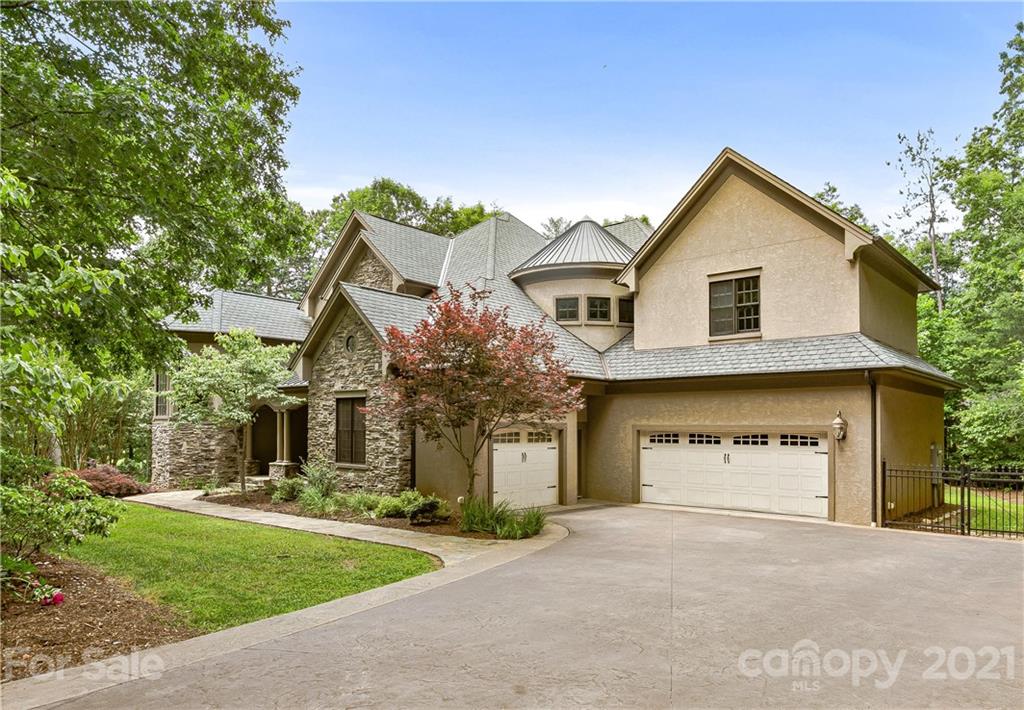 2 Ashbrook Meadows Fletcher, NC 28732 - Photo 39 of 48 a front view of a house with a yard and garage