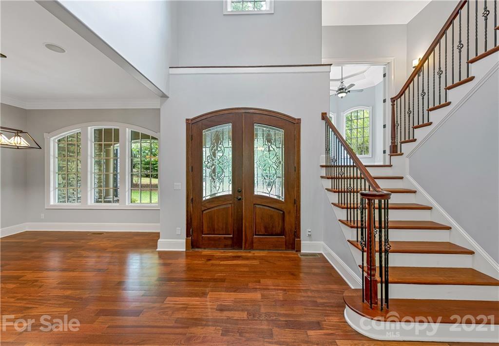 2 Ashbrook Meadows Fletcher, NC 28732 - Photo 8 of 48 a view of entryway and hall with wooden floor