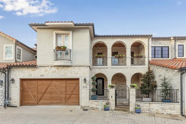 a front view of a house with white doors