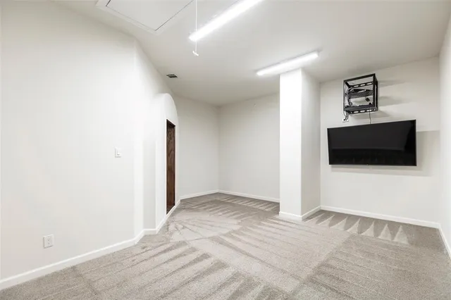 a bathroom with a granite countertop sink toilet a mirror and shower