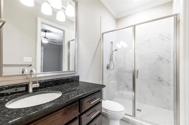 an aerial view of a house with a lake view