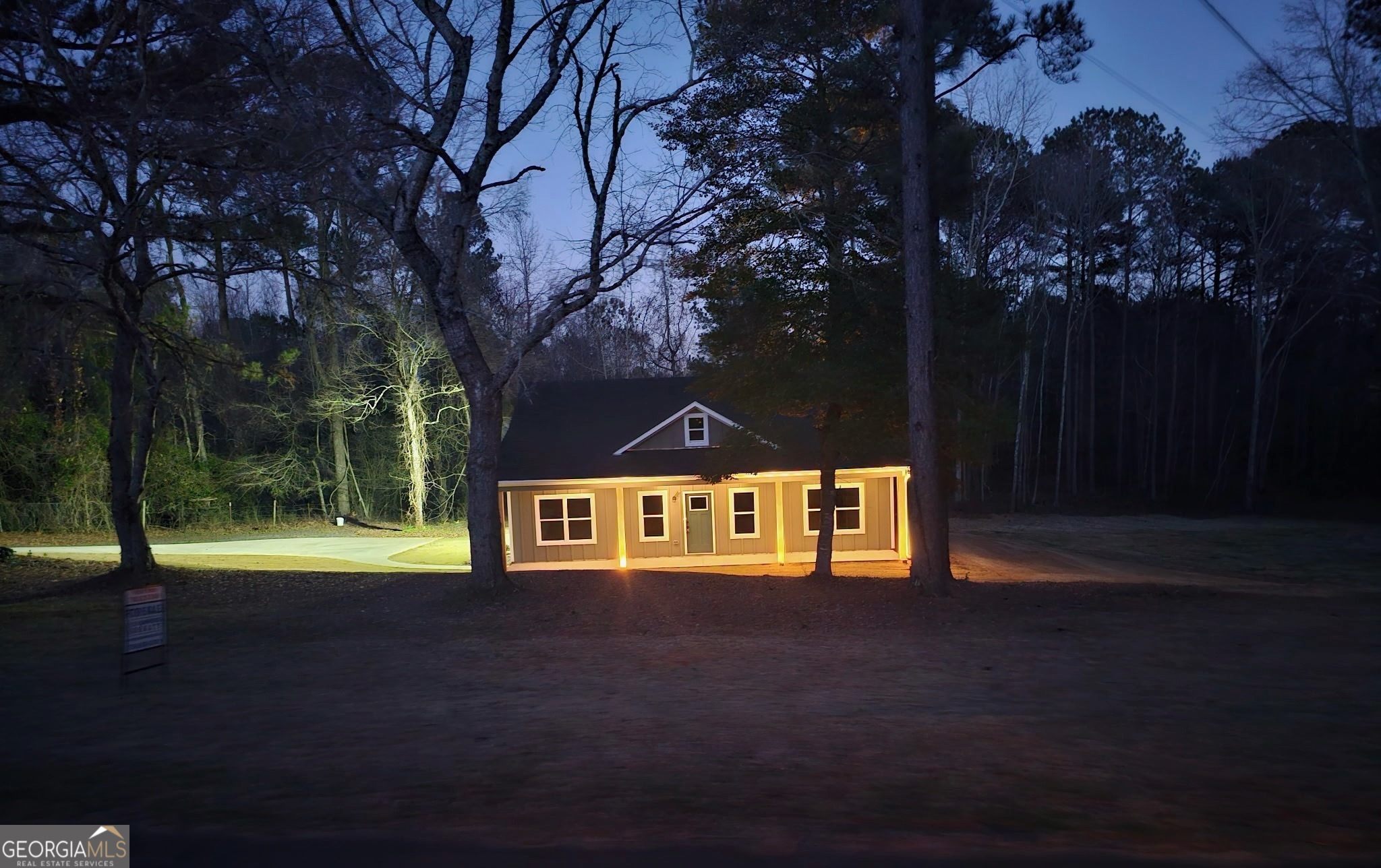 1251 South L Street Hamilton, GA 31811 - Photo 8 of 39 a front view of a house with a yard