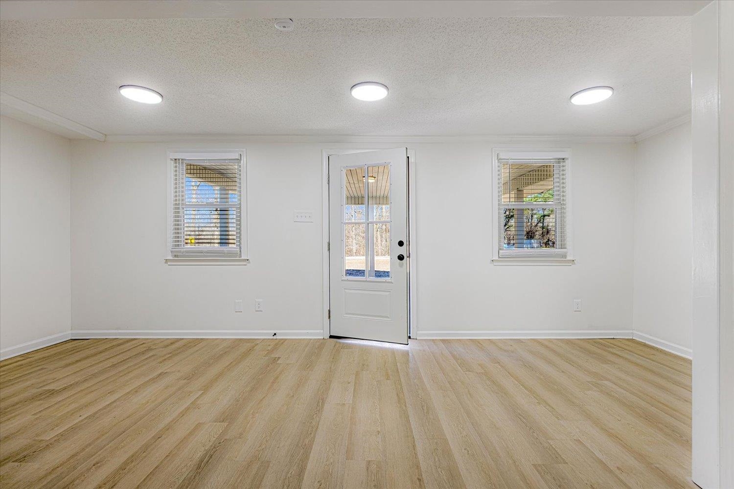 3148 Beaver Road Munford, TN 38058 - Photo 4 of 26 a view of room with wooden floor and window