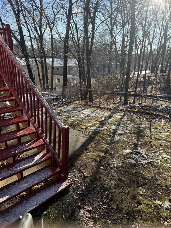 39 Silvia Court, Unit 39 Boston, MA 02136 - Photo 20 of 20 a view of a yard with wooden fence
