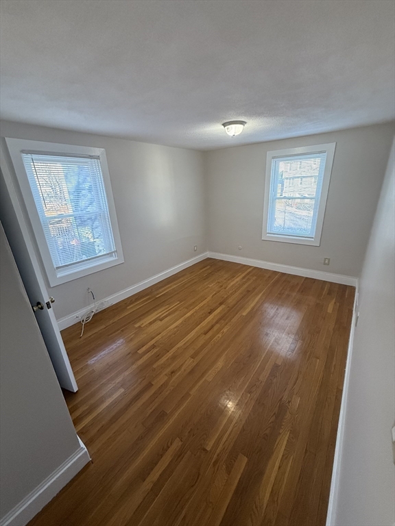 39 Silvia Court, Unit 39 Boston, MA 02136 - Photo 8 of 20 a view of an empty room and window