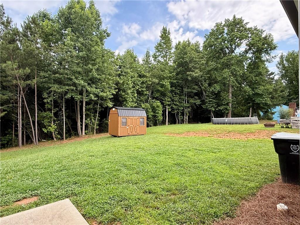 1776 Pleasant Grove Road Temple, GA 30179 - Photo 35 of 45 a house view with a outdoor space