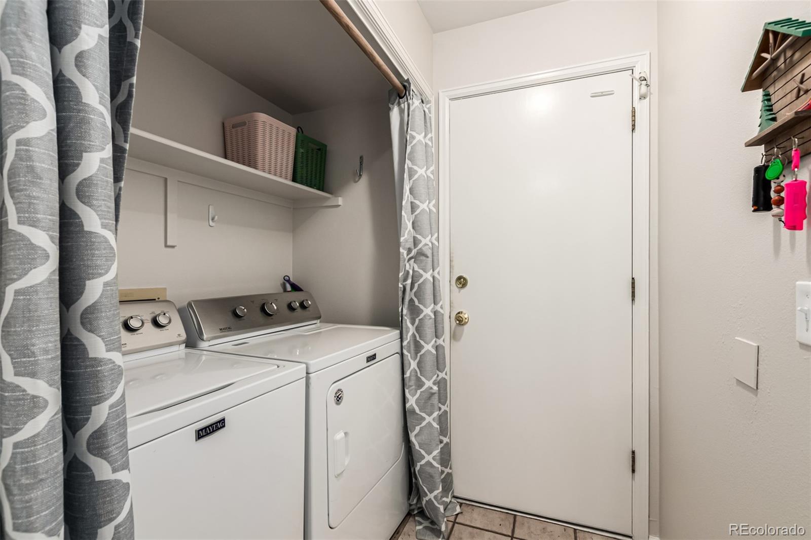 8837 South Cactus Flower Way Highlands Ranch, CO 80126 - Photo 37 of 42 a utility room with dryer and washer