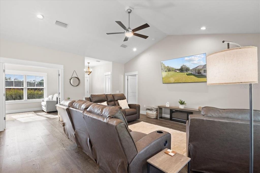 335 Southwest Arrowbend Drive Lake City, FL 32024 - Photo 15 of 50 a living room with furniture and a large window