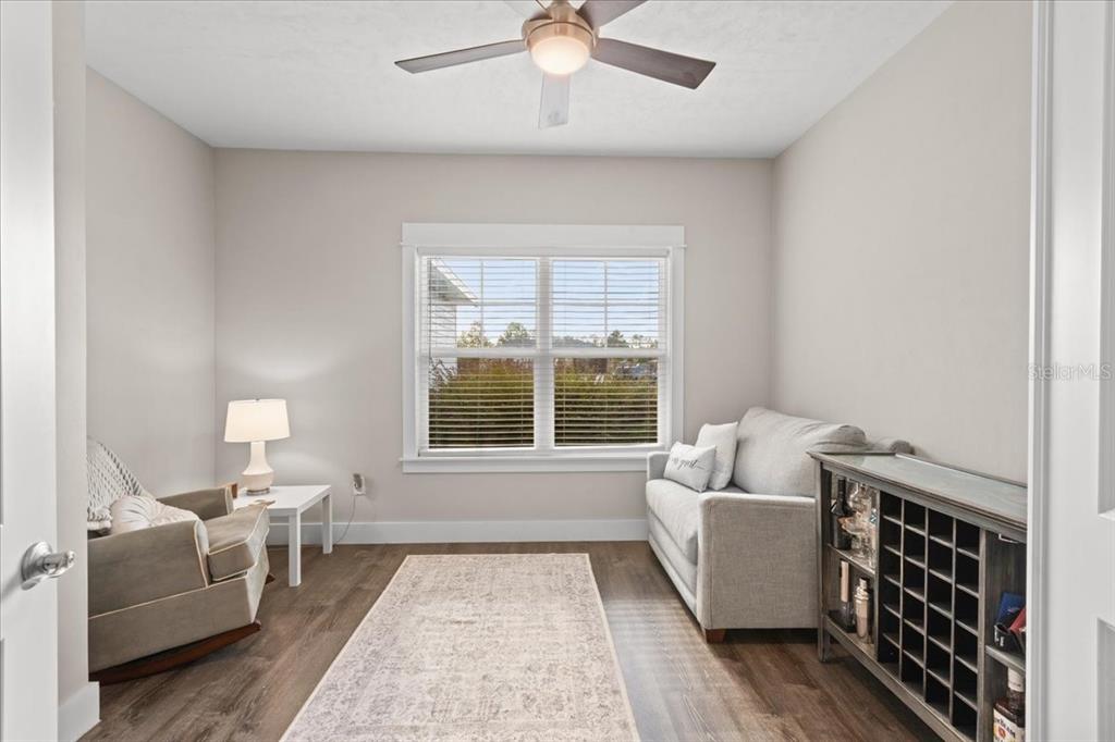 335 Southwest Arrowbend Drive Lake City, FL 32024 - Photo 21 of 50 a living room with furniture and a window