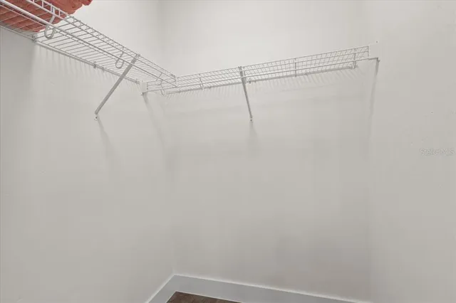 a view of a room with racks on the wall