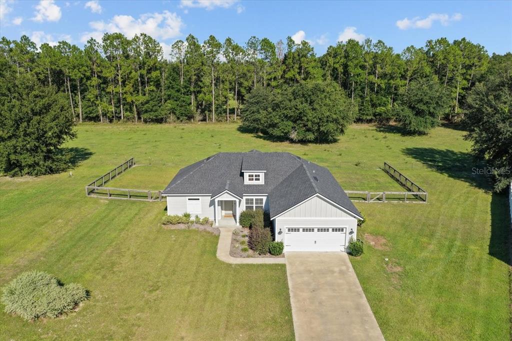 335 Southwest Arrowbend Drive Lake City, FL 32024 - Photo 35 of 50 an aerial view of a house with a yard basket ball court and outdoor seating