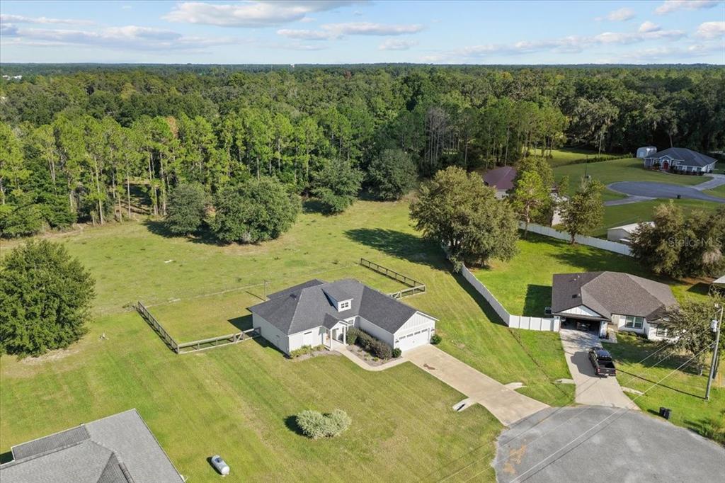 335 Southwest Arrowbend Drive Lake City, FL 32024 - Photo 41 of 50 a view of a swimming pool with a patio