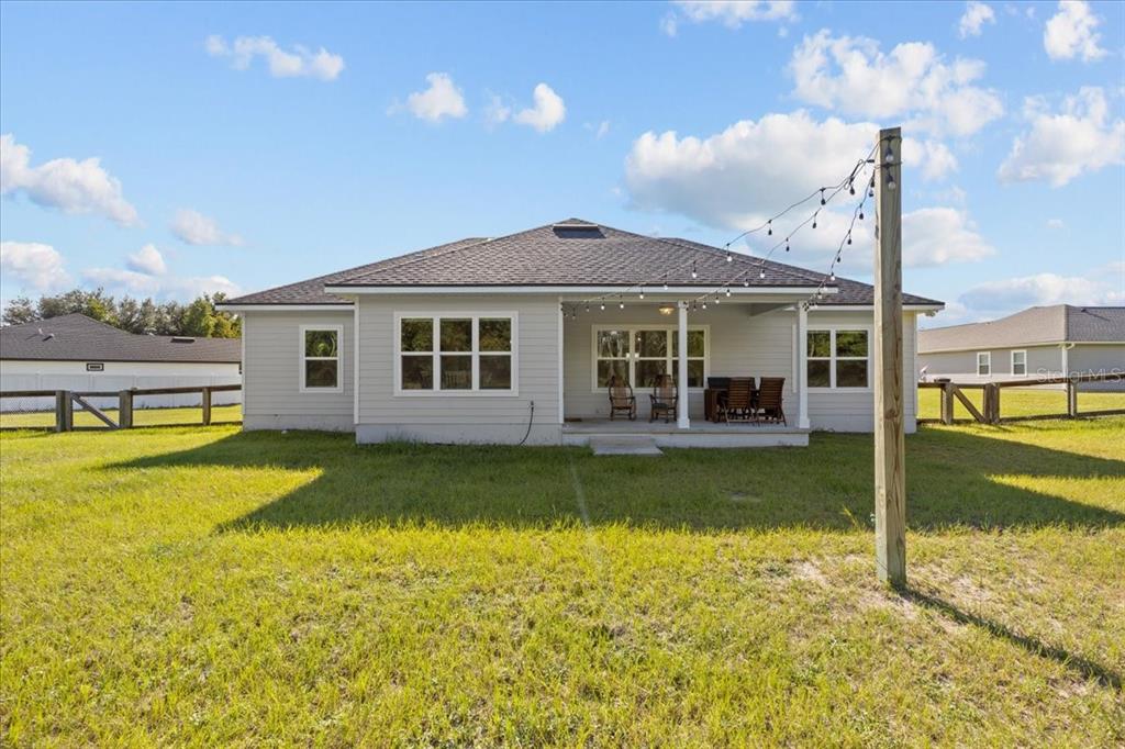 335 Southwest Arrowbend Drive Lake City, FL 32024 - Photo 48 of 50 a view of a house with a swimming pool