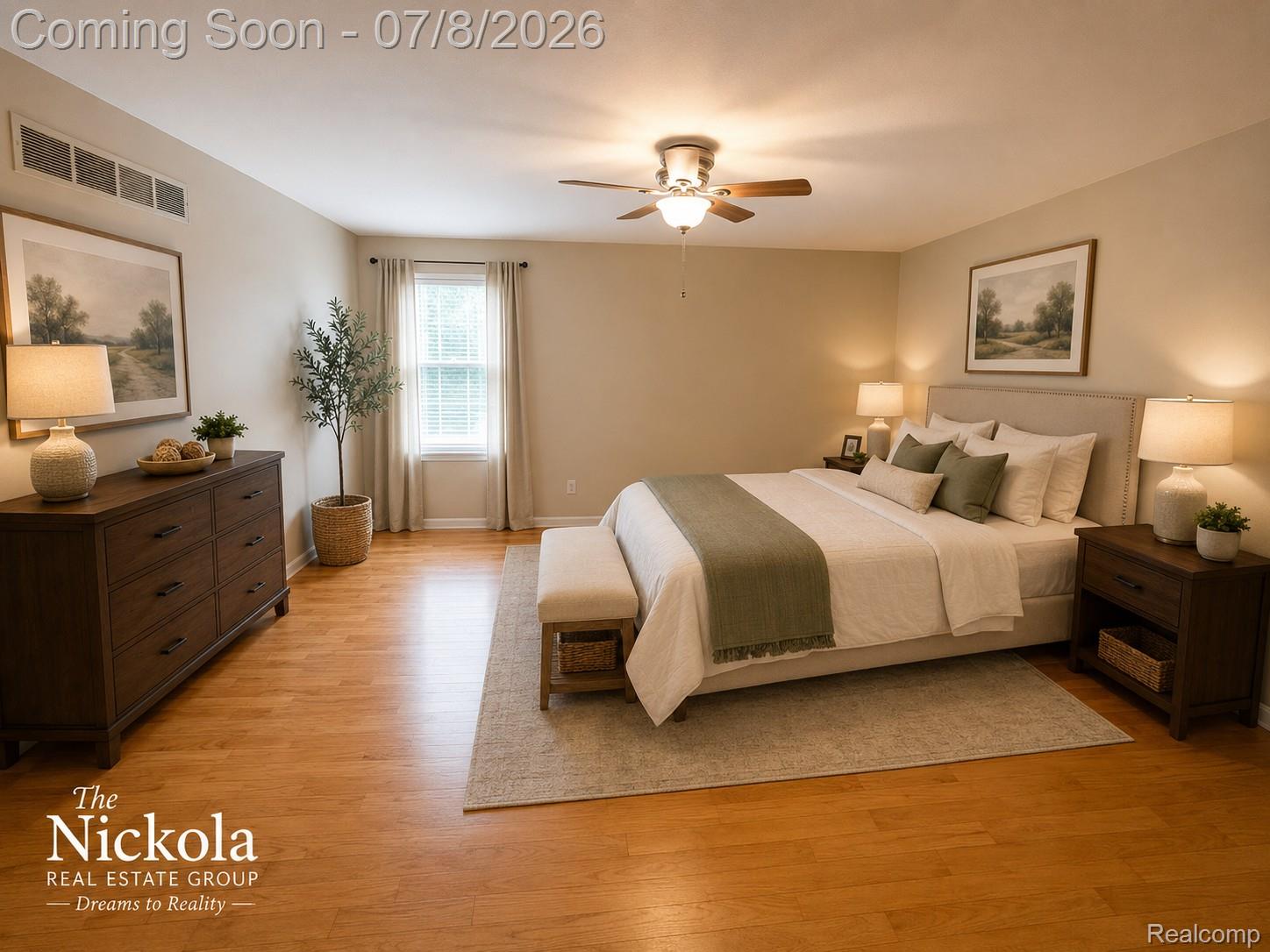 414 Whitney Drive Rochester, MI 48307 - Photo 21 of 30 Spacious bedroom with wood-finish flooring, neutral wall tones, and a ceiling fan with integrated lighting