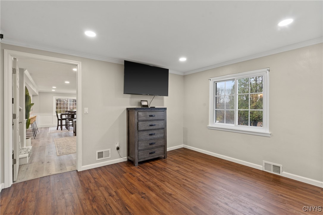 3860 South St Road Marcellus, NY 13108 - Photo 17 of 41 First Floor Primary Bedroom with Ensuite Bathroom