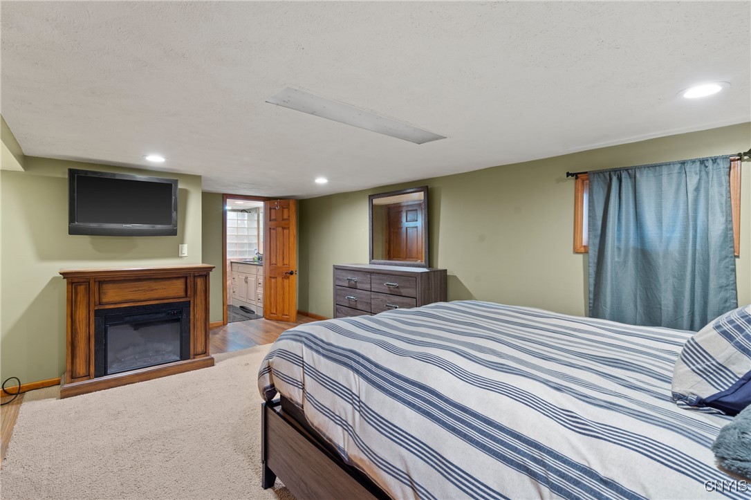 3860 South St Road Marcellus, NY 13108 - Photo 32 of 41 Basement bedroom with full bathroom