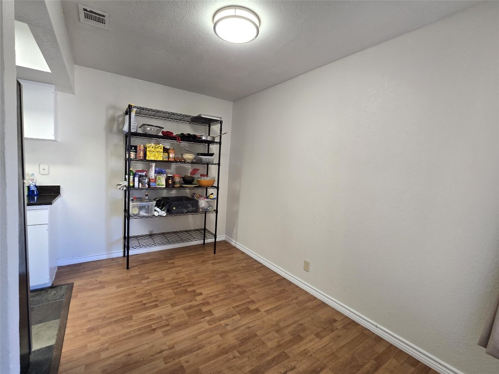 2600 Penny Lane, Unit 212 Austin, TX 78757 - Photo 6 of 35 Dining room is adjacent to kitchen and has a view to the balcony