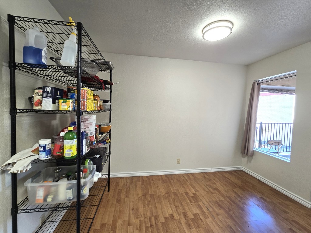 2600 Penny Lane, Unit 212 Austin, TX 78757 - Photo 10 of 35 Dining room with view of balcony