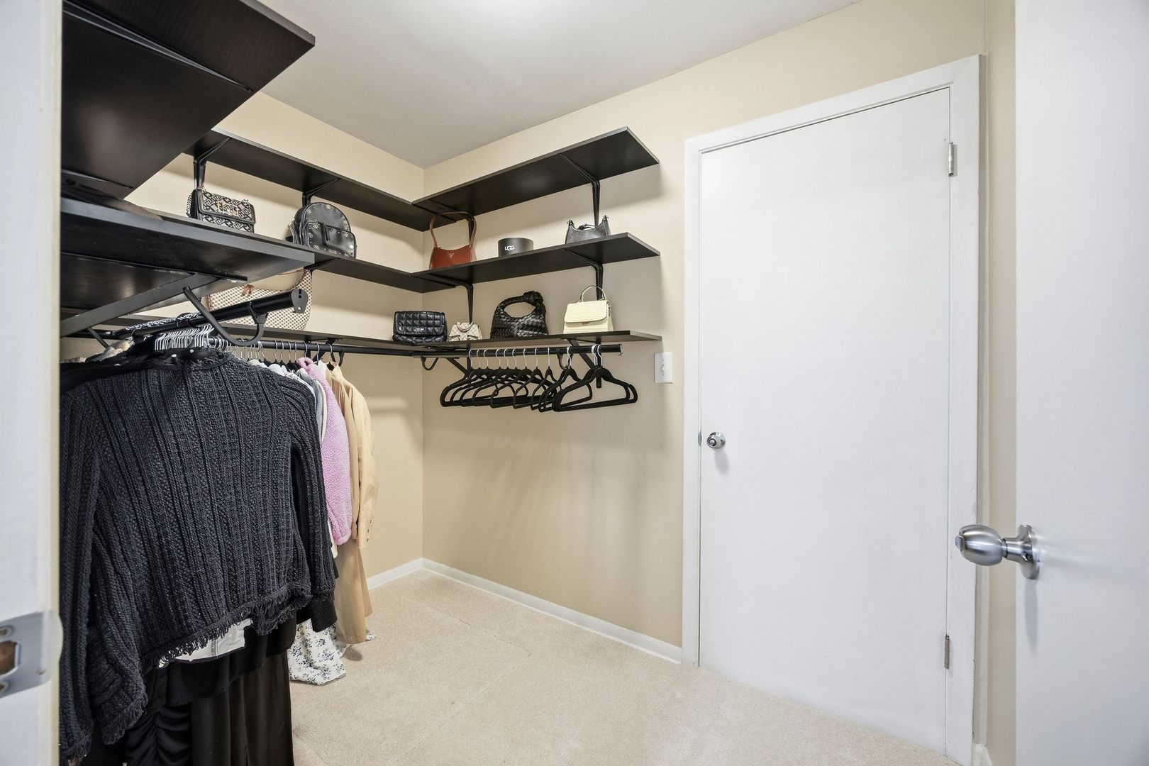 2117 Grouse Lane Rolling Meadows, IL 60008 - Photo 15 of 25 a view of walk in closet with clothes and shoes