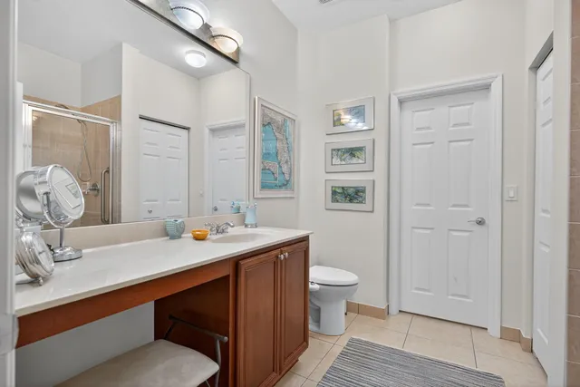 a bathroom with a sink double vanity and a mirror