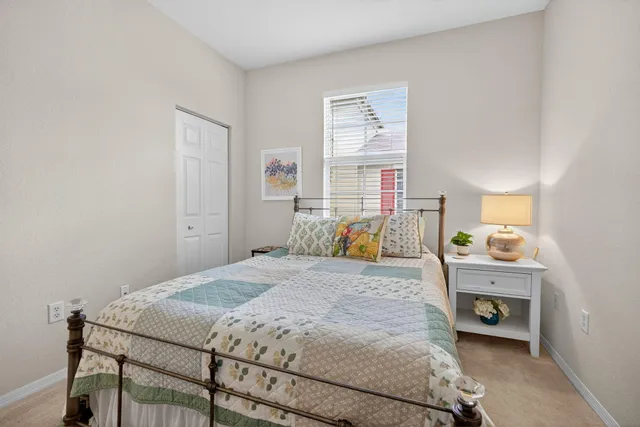a view of a hallway with closet and entryway