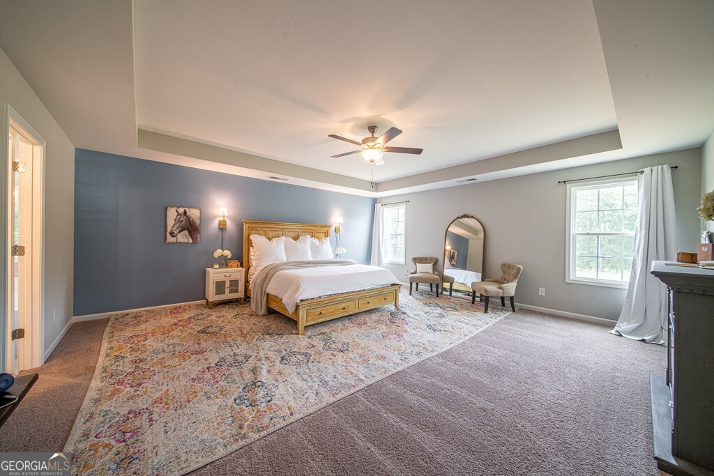 62 James Creek Road Fortson, GA 31808 - Photo 28 of 49 a bedroom with furniture and a window