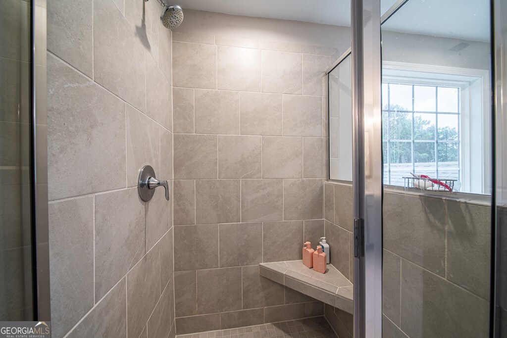 62 James Creek Road Fortson, GA 31808 - Photo 34 of 49 a bathroom with a shower