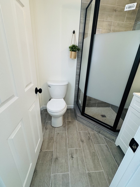 73 Victoria Street Revere, MA 02151 - Photo 19 of 24 a bathroom with a sink and a toilet