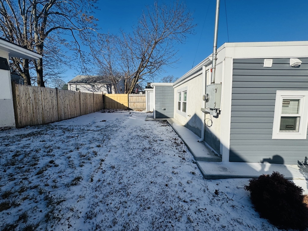 73 Victoria Street Revere, MA 02151 - Photo 2 of 24 a view of a backyard of the house