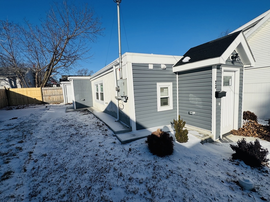 73 Victoria Street Revere, MA 02151 - Photo 21 of 24 a view of a back yard of the house